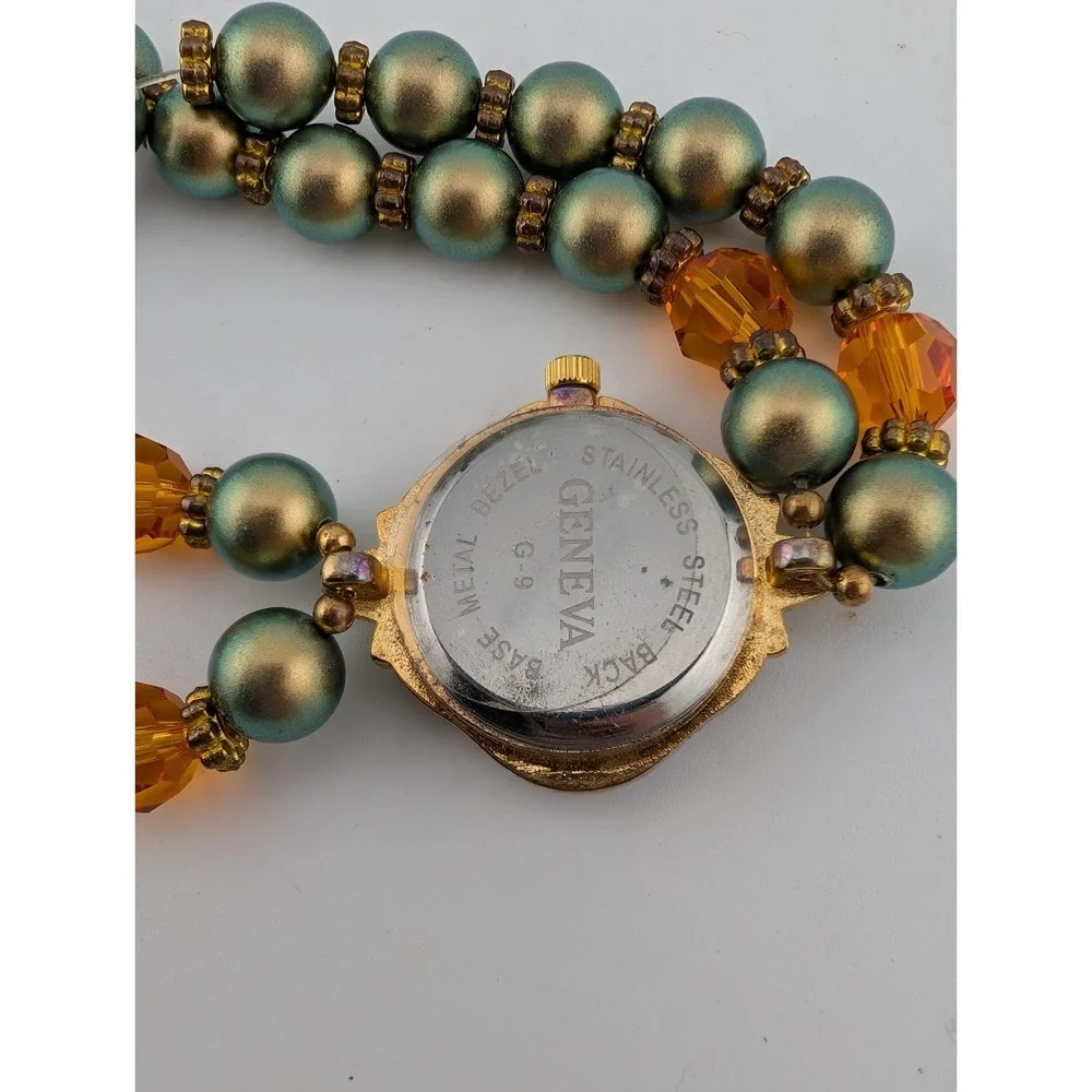 Geneva Watch Women 25mm Case Green & Orange Beaded Stretch Band- New Battery